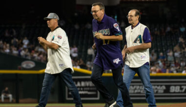 Luis Gonzalez, Mark Grace and Bob Brenly throw out the Ceremonial First Pitch prior to the MLB game...