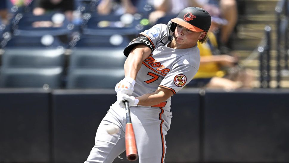 TAMPA, FL - JUL 20: Baltimore Orioles Infielder Jackson Holliday (7) drives the ball over the fence for a home run in the first inning during the regular season game between the Baltimore Orioles and the Tampa Bay Rays on July 20, 2025 at George M. Steinbrenner Field in Tampa, Florida. (Photo by Cliff Welch/Icon Sportswire) (Icon Sportswire via AP Images)