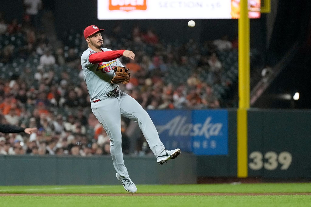 St. Louis Cardinals third base Nolan Arenado throws to first base on the ground out by San Francisco Giants' Matt Chapman during the fifth inning of a baseball game Friday, Sept. 27, 2024, in San Francisco.