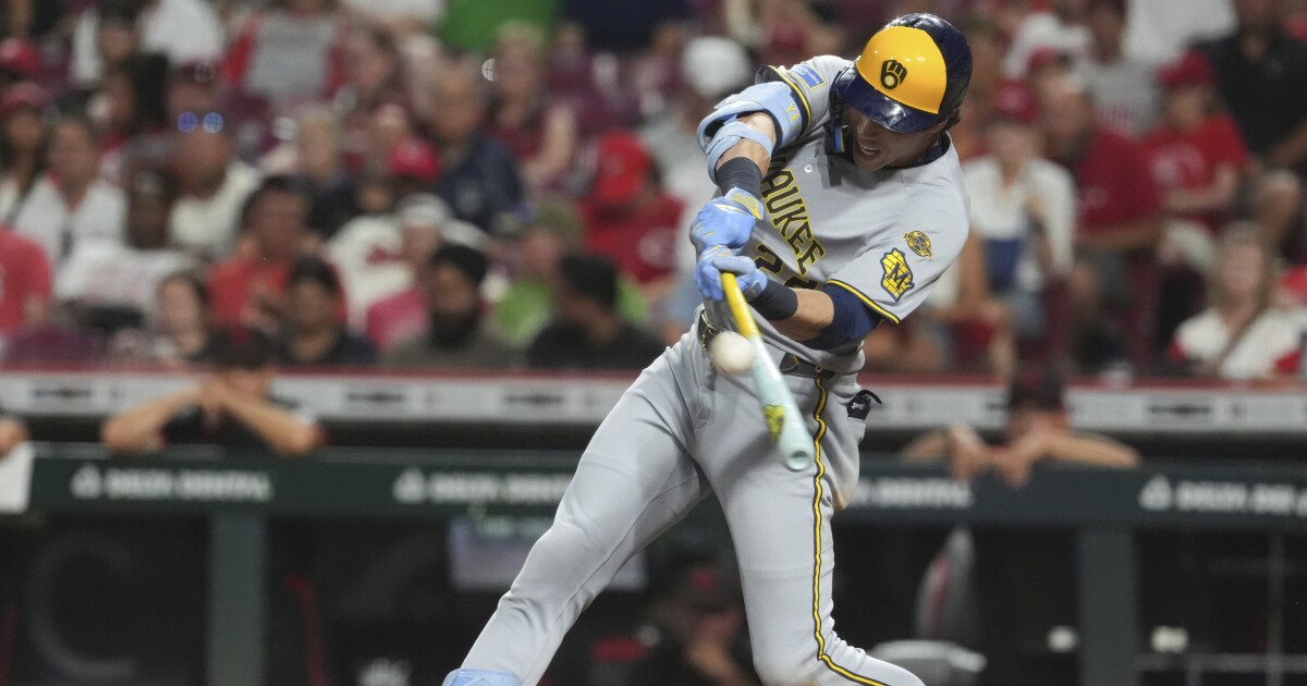 Yelich hits 2 HRs as MLB-best Brewers rally past Reds 10-8