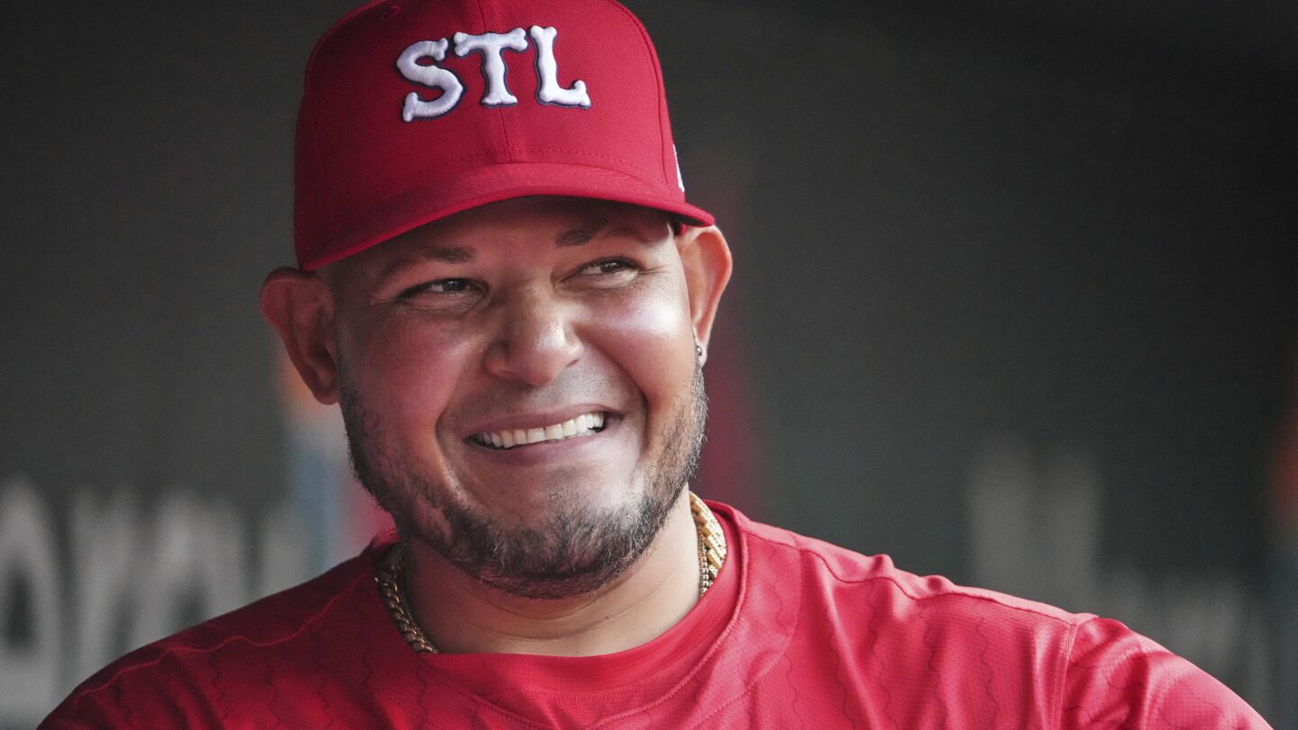 Former All-Star catcher Yadier Molina returns to Cardinals' dugout as temporary coach