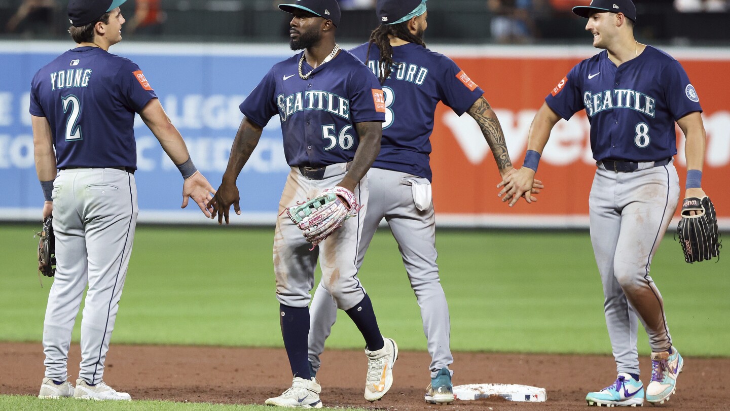 Mariners catch Astros in the AL West after beating Baltimore for their 8th straight win
