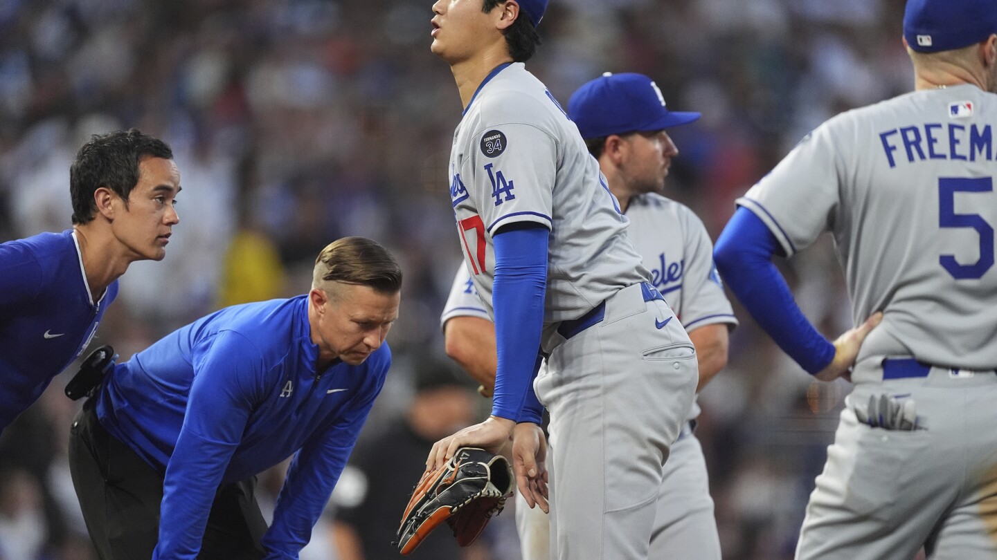 Dodgers' Ohtani roughed up by Rockies, leaves game after getting hit on right thigh by line drive