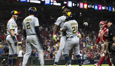 Brewers win 14th straight by beating Reds in 11 innings