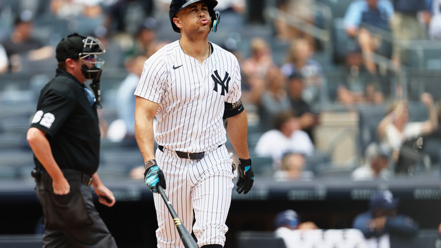 Stanton and Rice hit early homers as Yankees beat Rays 7-4 on busy trade-deadline day