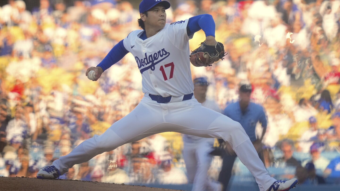 Ohtani uses fewer fastballs, more off-speed pitches to earn 1st win with Dodgers