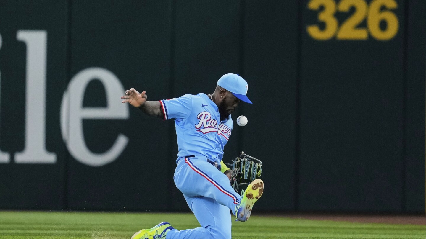 Rangers put Adolis García on IL and activate Evan Carter