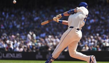 Cal Raleigh hits 48th, 49th homers to set MLB season mark for catchers, passes Salvador Perez