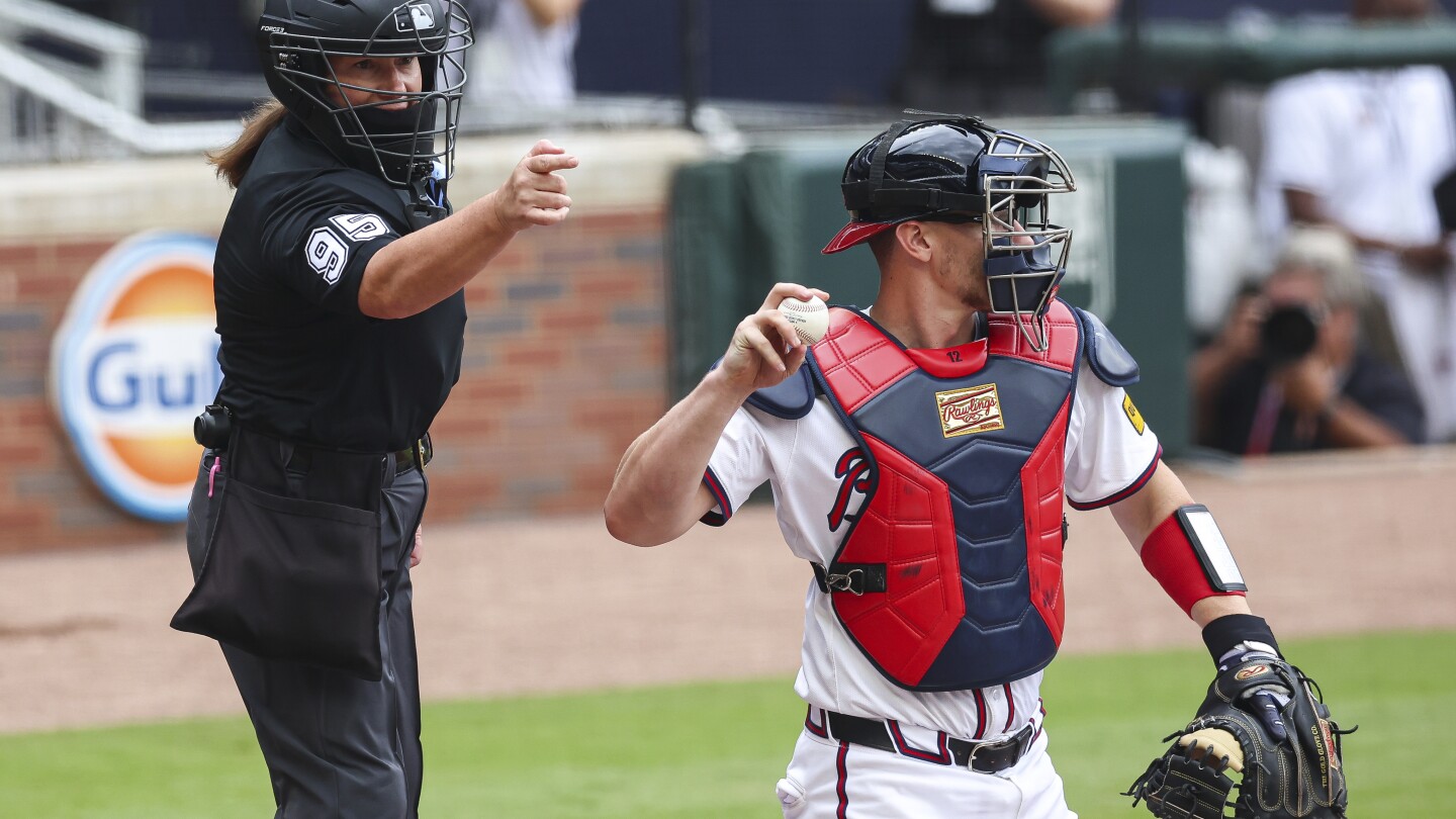 Jen Pawol doesn't flinch while becoming the majors' first female umpire to work behind the plate