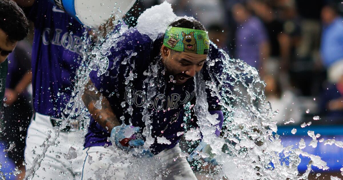 Dodgers can't stop Rockies from rallying to walk-off win