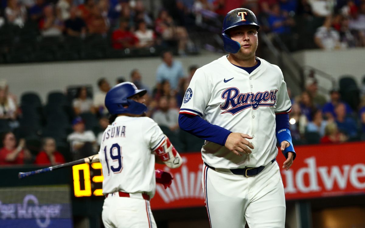 Texas Rangers designated hitter Joc Pederson (4) reacts after scoring during the fourth inning against the Los Angeles Angels at Globe Life Field. Texas Rangers designated hitter Joc Pederson (4) reacts after scoring during the fourth inning against the Los Angeles Angels at Globe Life Field.