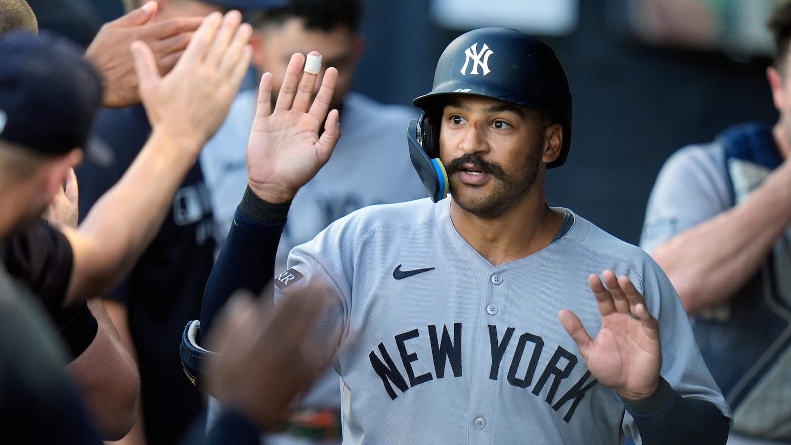 Stanton’s 10th-inning homer lifts Yankees over Rays 6-4 for first extra-inning win on road