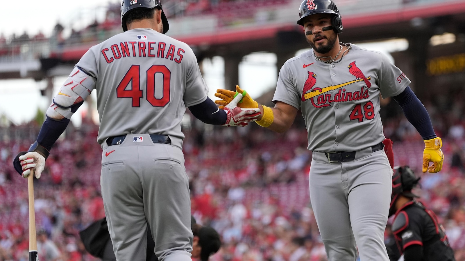 Winn drives in 3 runs, Cardinals take advantage of De La Cruz's error in 10th for 7-5 win over Reds