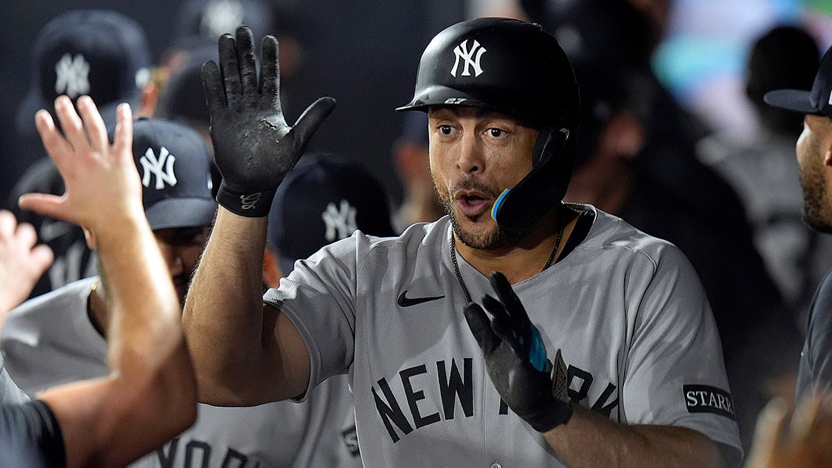 Giancarlo Stanton celebrates