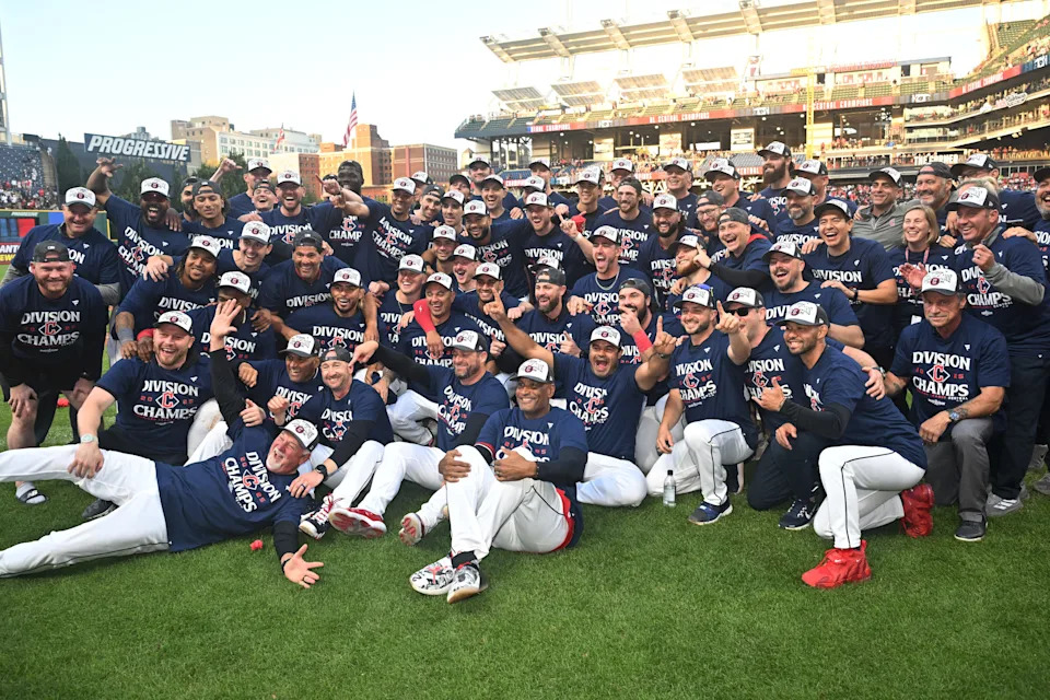 The Cleveland Guardians celebrate after winning the American League Central Division at Progressive Field on Sept. 28, 2025, in Cleveland.