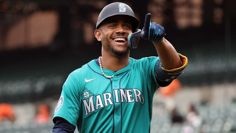 Seattle Mariners outfielder Julio Rodriguez smiles