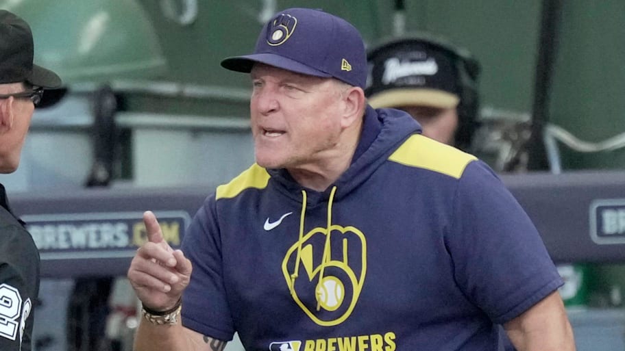 Milwaukee Brewers manager Pat Murphy questions a call with umpire Jim Wolf