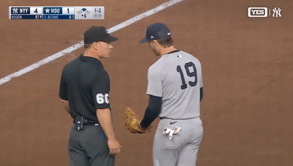 Ryan McMahon pled his case — that he caught the ball and lost it on the transfer — to no avail. YES