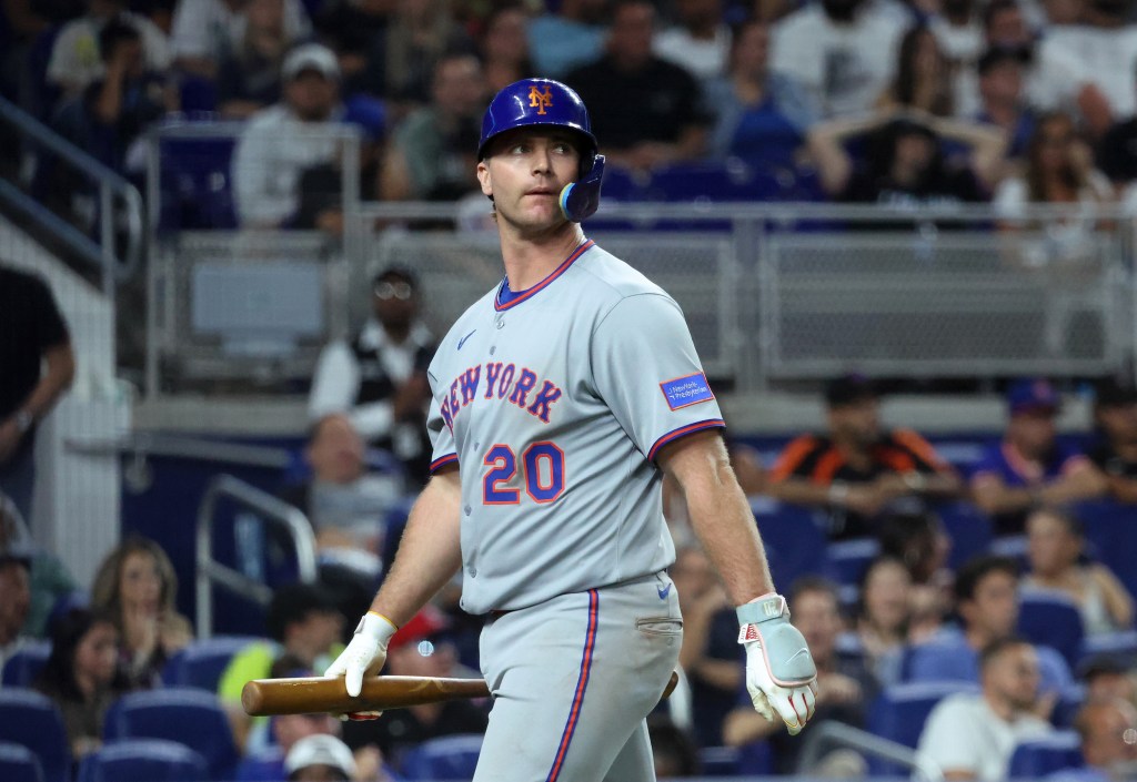 Pete Alonso walks back to the dugout after striking out on Friday.