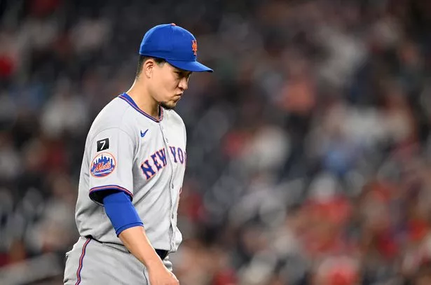 Kodai Senga #34 of the New York Mets walks to the dugout after being taken out of the game against the Washington Nationals at Nationals Park on August 20, 2025 in Washington, DC