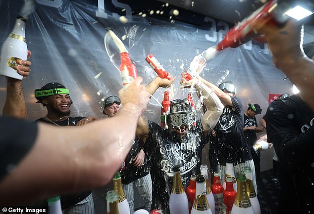 Plastic coverings lined the lockers to attempt to keep the players personal belongings dry