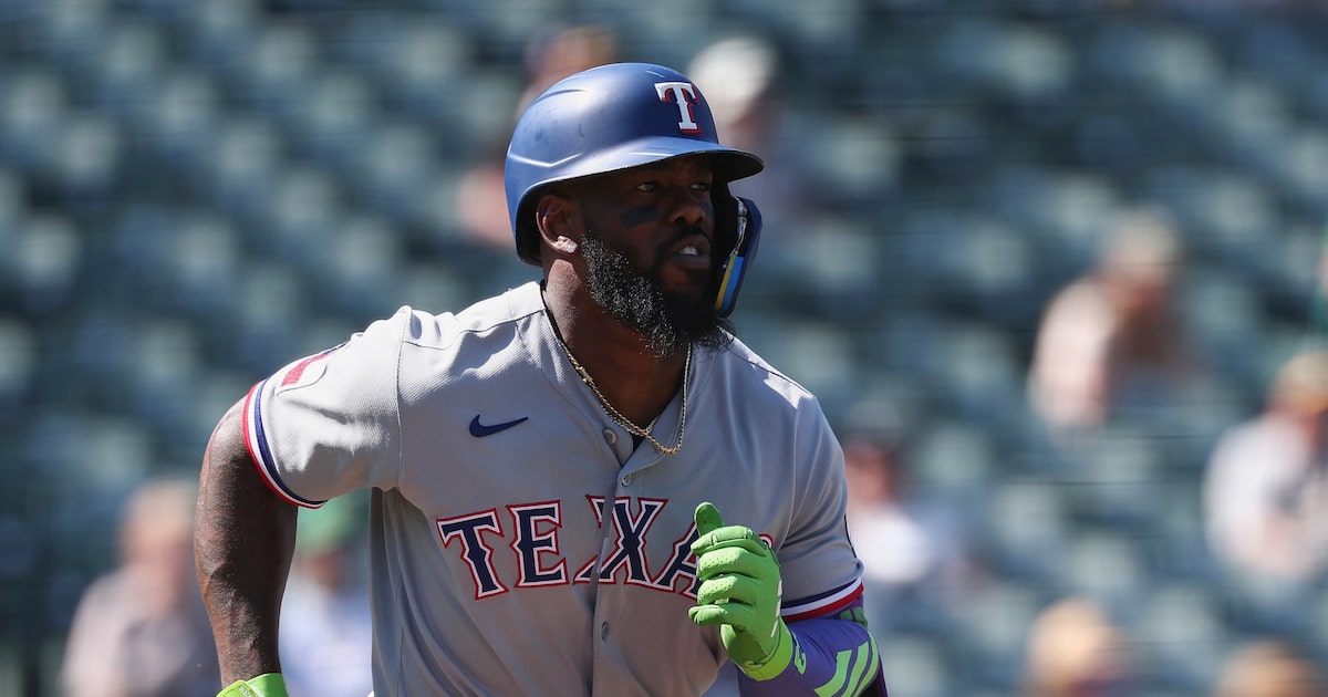 Adolis García exits Rangers’ game vs. Diamondbacks with lower body injury