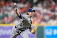 Texas Rangers starting pitcher Jacob deGrom throws against the Houston Astros during the...