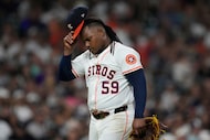 Houston Astros starting pitcher Framber Valdez leaves the mound after the top of the fifth...
