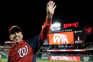 FILE - In this Sept. 22, 2013, file photo, Washington Nationals manager Davey Johnson waves...