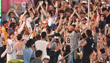 In Photos: Fans celebrate in Osaka after Tigers clinch Central League baseball title