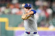 Texas Rangers starting pitcher Jack Leiter delivers to Houston Astros' Jeremy Peña during...