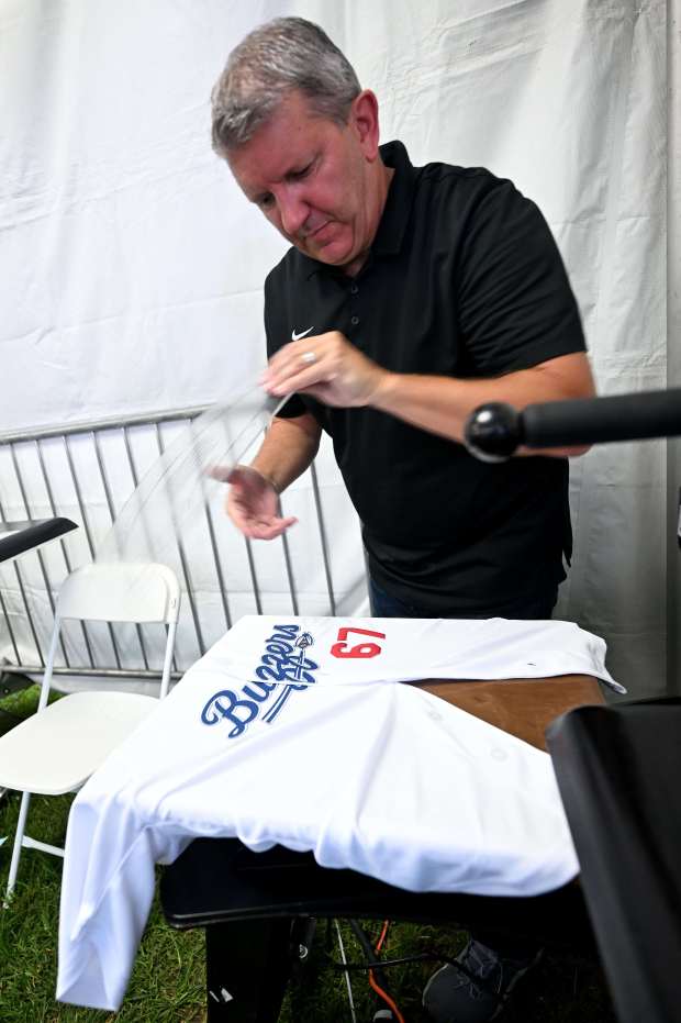 Dayn Floyd makes a personalized Ontario Tower Buzzers jersey for...