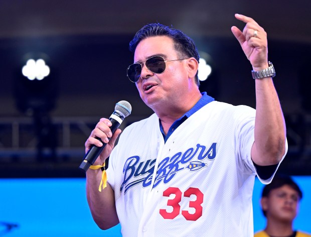 Ontario Tower Buzzers general manager Allan Benavides speaks to the...