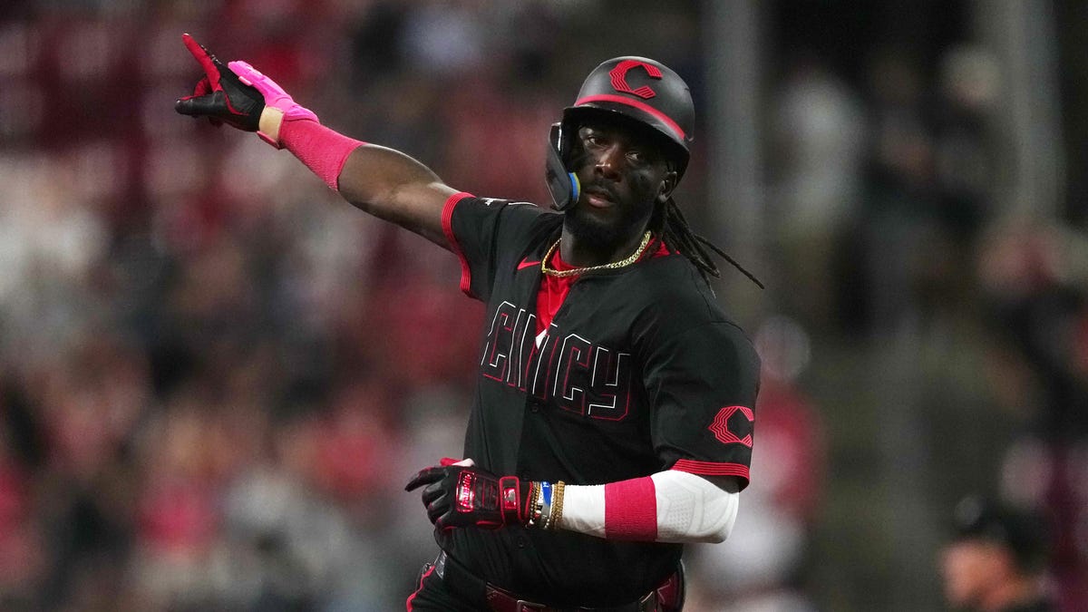 Cincinnati Reds power past Chicago Cubs, keep heat on New York Mets
