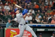 Texas Rangers' Wyatt Langford at bat against Houston Astros relief pitcher Bryan King during...