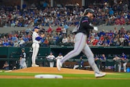 Miami Marlins' Connor Norby, right, runs the bases after hitting a solo home run off Texas...