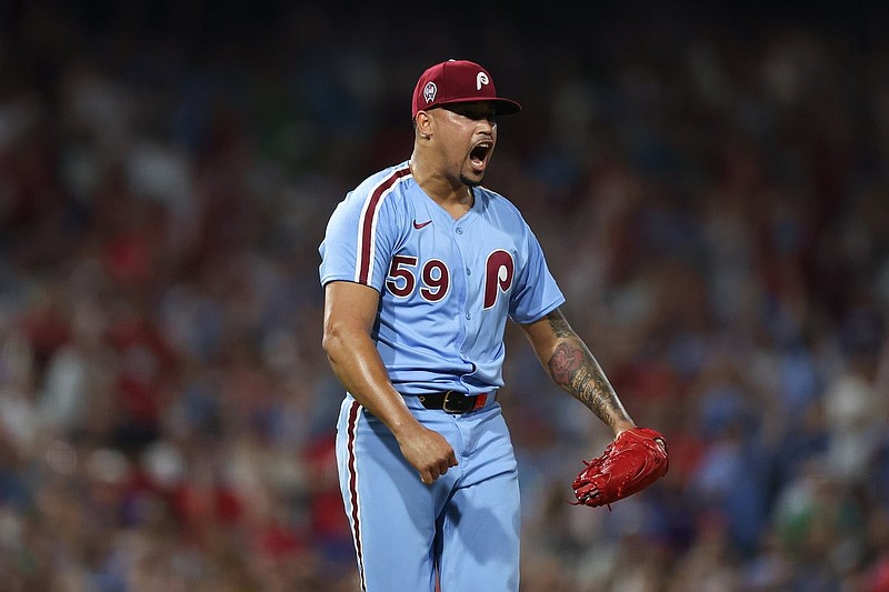 Sep 11, 2025; Philadelphia, Pennsylvania, USA; Philadelphia Phillies pitcher Jhoan Duran (59) reacts after a strike out to end the game with a win against the New York Mets at Citizens Bank Park. Mandatory Credit: Bill Streicher-Imagn Images