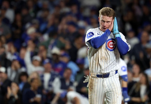 Chicago Cubs center fielder Pete Crow-Armstrong gestures after scoring on a wild pitch in the fifth inning of a game against the New York Mets at Wrigley Field in Chicago on Sept. 24, 2025. (Chris Sweda/Chicago Tribune)