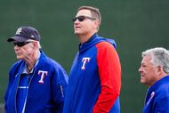 Texas Rangers president of baseball operations Chris Young (center) watches a “B” game...
