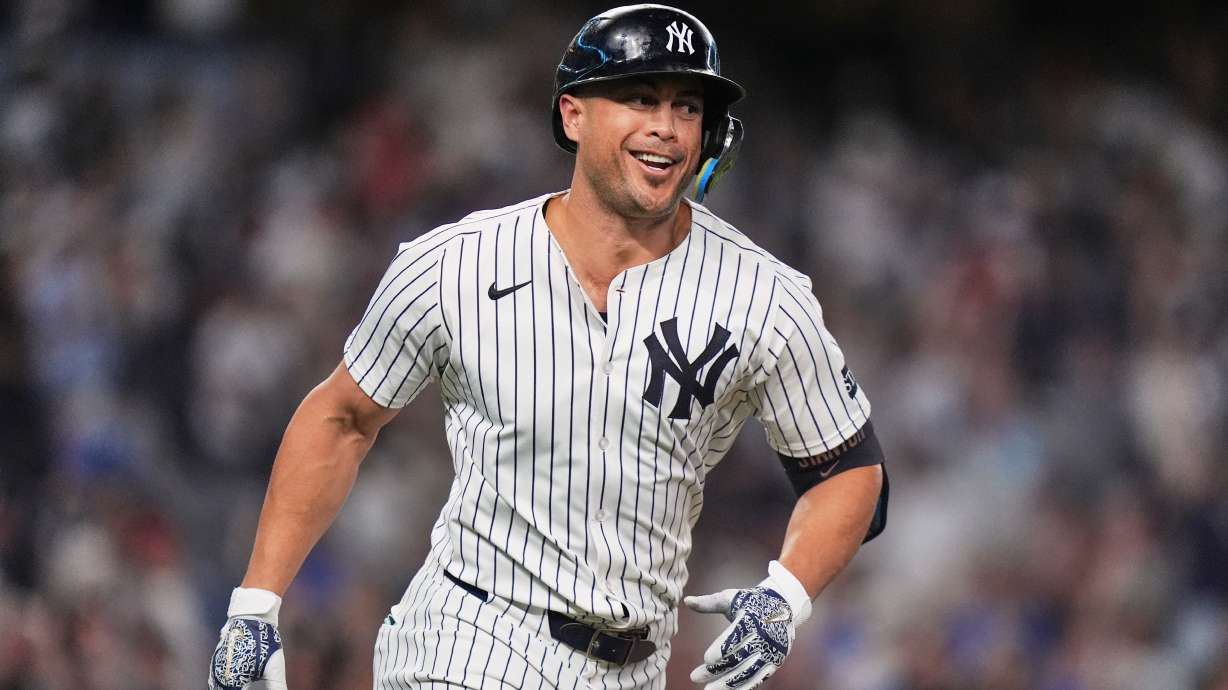Stanton has pair of 2-run homers, Judge hits 52nd, Yanks beat Orioles to stay tied for AL East lead