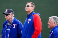 Texas Rangers president of baseball operations Chris Young (center) watches a “B” game...
