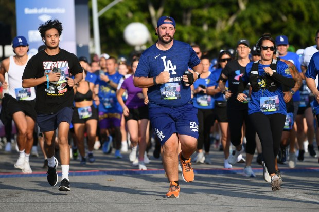 Runners start the 5K race during the 12th Annual Los...