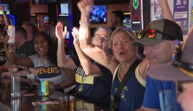Brewers beat Reds, making history with club-record 97th win; fans celebrate