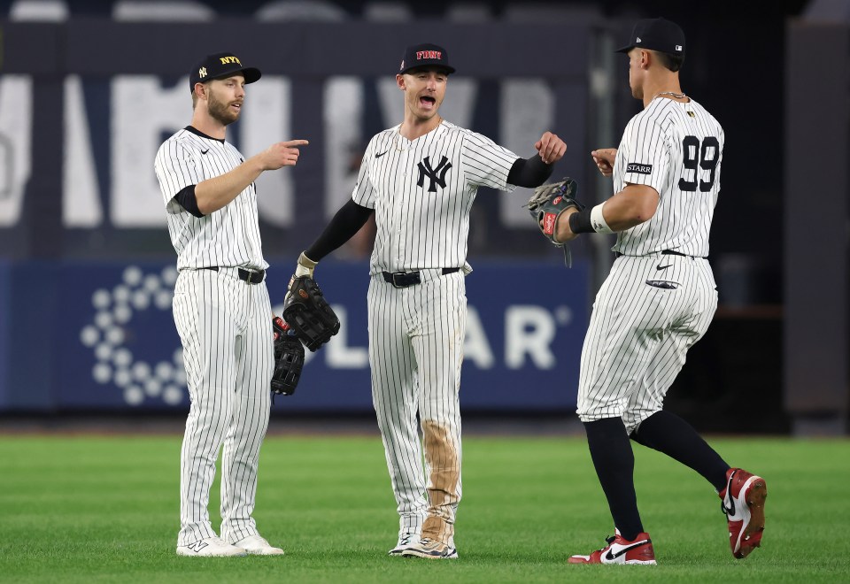 New York Yankees players celebrating a win.