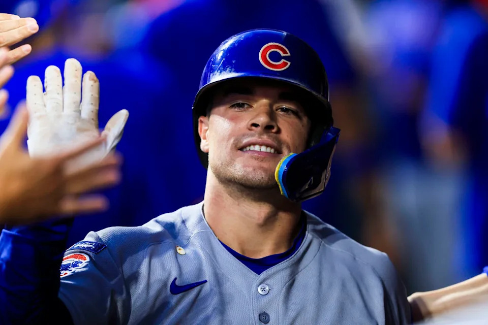 Sep 19, 2025; Cincinnati, Ohio, USA; Chicago Cubs third baseman Matt Shaw (6) high fives teammates after hitting a two-run home run in the fourth inning against the Cincinnati Reds at Great American Ball Park. Mandatory Credit: Katie Stratman-Imagn Images© Katie Stratman-Imagn Images