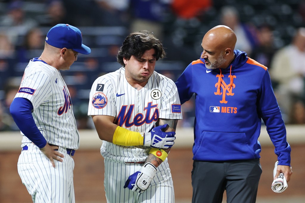 Francisco Alvarez #4 of the New York Mets reacts after getting hit by a pitch during the eighth inning against the San Diego Padres at Citi Field on September 16, 2025 in the Queens.