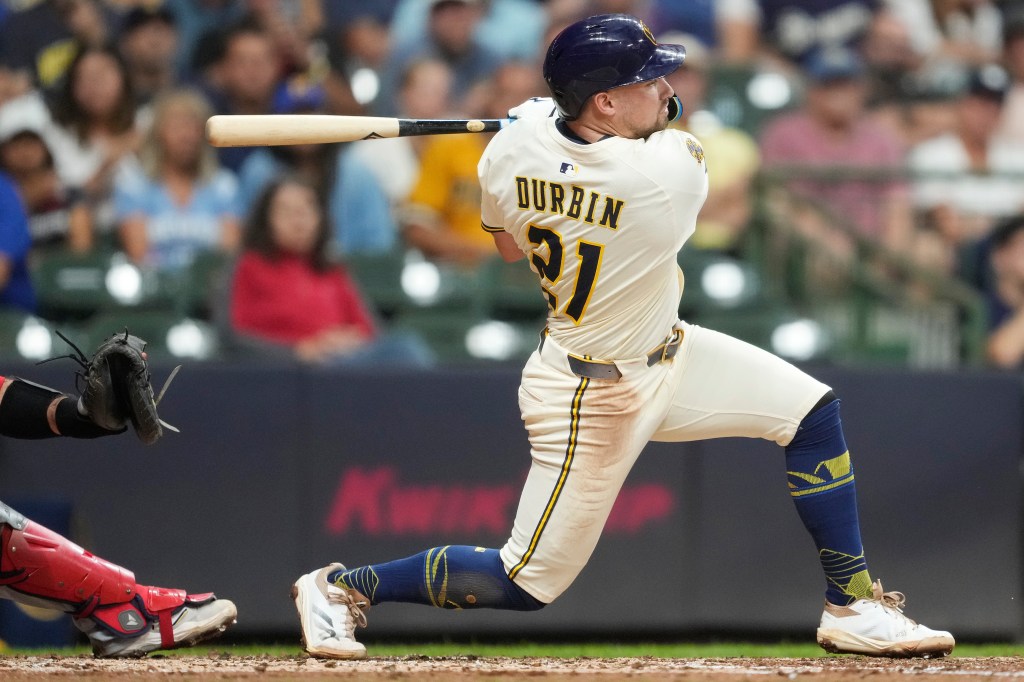 Milwaukee Brewers batter Blake Durbin swinging the bat during a game.