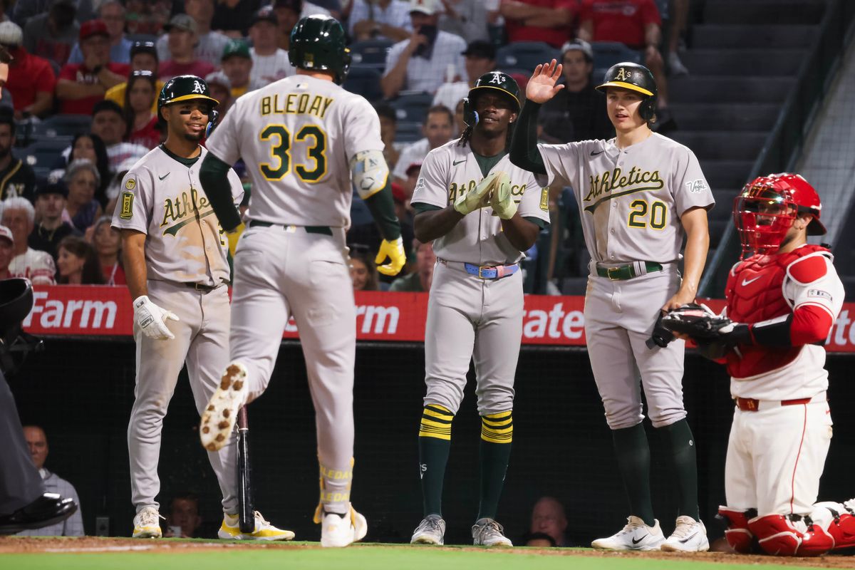 Sacramento Athletics outfielder JJ Bleday (33) celebrates hitting a grand slam during the MLB game against the Los Angeles Angels Friday September 5th, 2025 at Angel's Stadium in Anaheim, Calif. Sacramento Athletics outfielder JJ Bleday (33) celebrates hitting a grand slam during the MLB game against the Los Angeles Angels Friday September 5th, 2025 at Angel's Stadium in Anaheim, Calif.