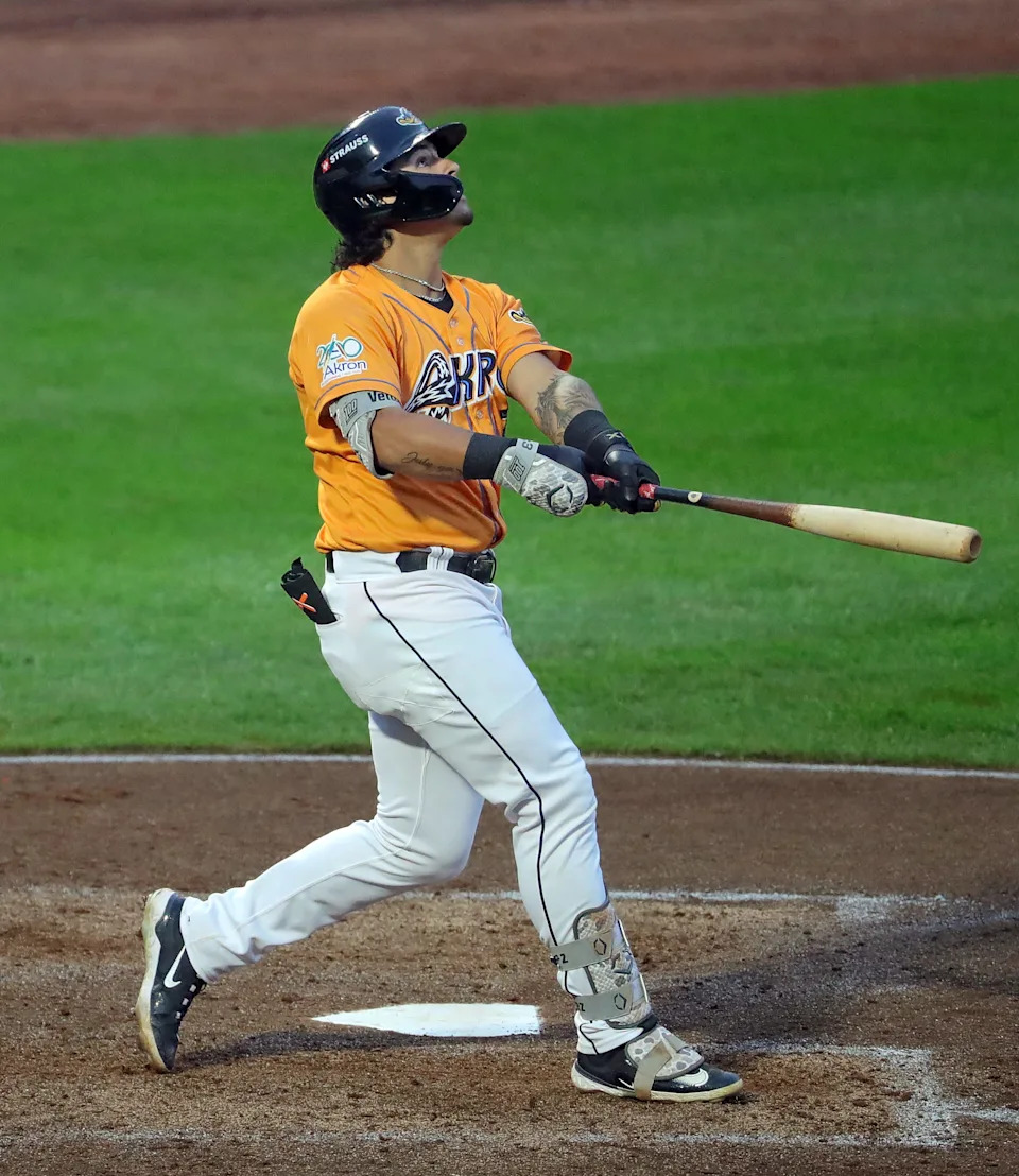 Akron RubberDucks designated hitter Ralphy Velazquez watches his shot down the first base line during the fifth inning of a Minor League Baseball game at Canal Park, Aug. 21, 2025, in Akron, Ohio.