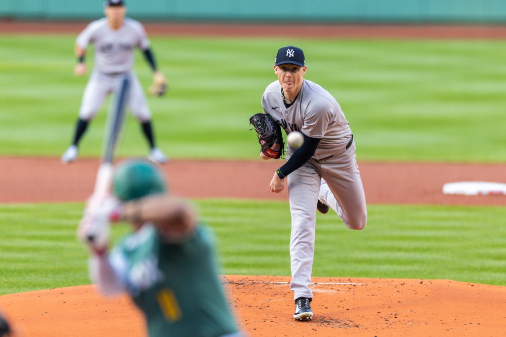 New York Yankees pitcher throwing a pitch.